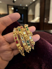 Traditional Gold-Tone Kundan Style Bangle Set – Red, Green & Clear Stones | 4-Piece Statement Bangles 7717