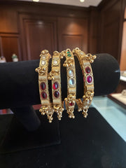 Traditional Gold-Tone Kundan Style Bangle Set – Red, Green & Clear Stones | 4-Piece Statement Bangles 7717