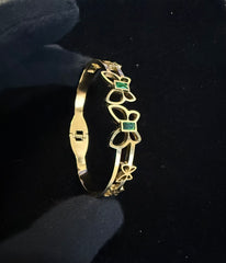Gold Tone Stainless Steel Butterfly Bangle Bracelet with Green Stone Accents 8063